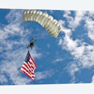 US Air Force Member Glides Through The Sky With The American Flag Canvas Wall Art – Gift For Military Personnel