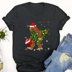 Ugly Christmas T Shirt, Bigfoot Carrying Christmas…